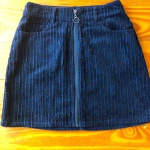 Black corduroy mini skirt.